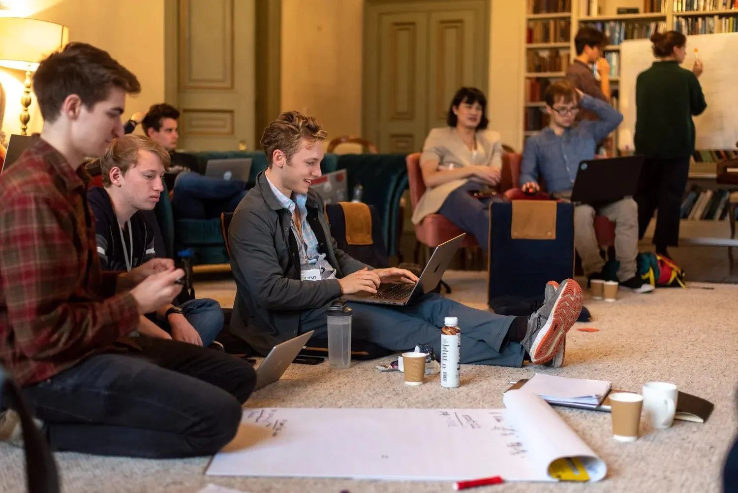 A small group discussing around a table